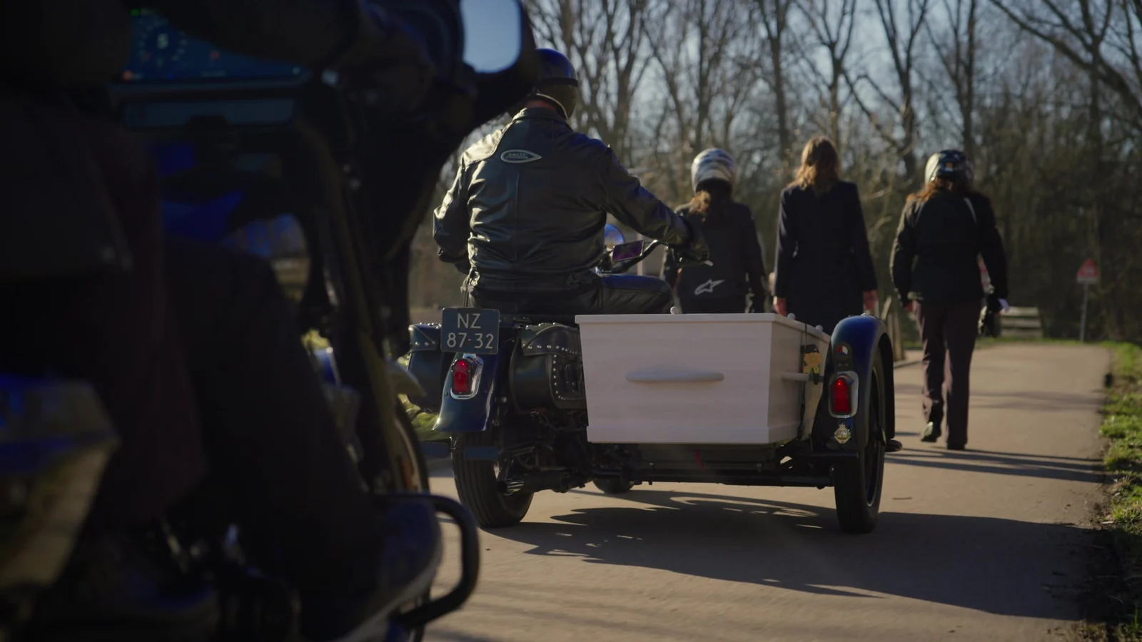 Motor met zijspan tijdens een bijzondere laatste rit